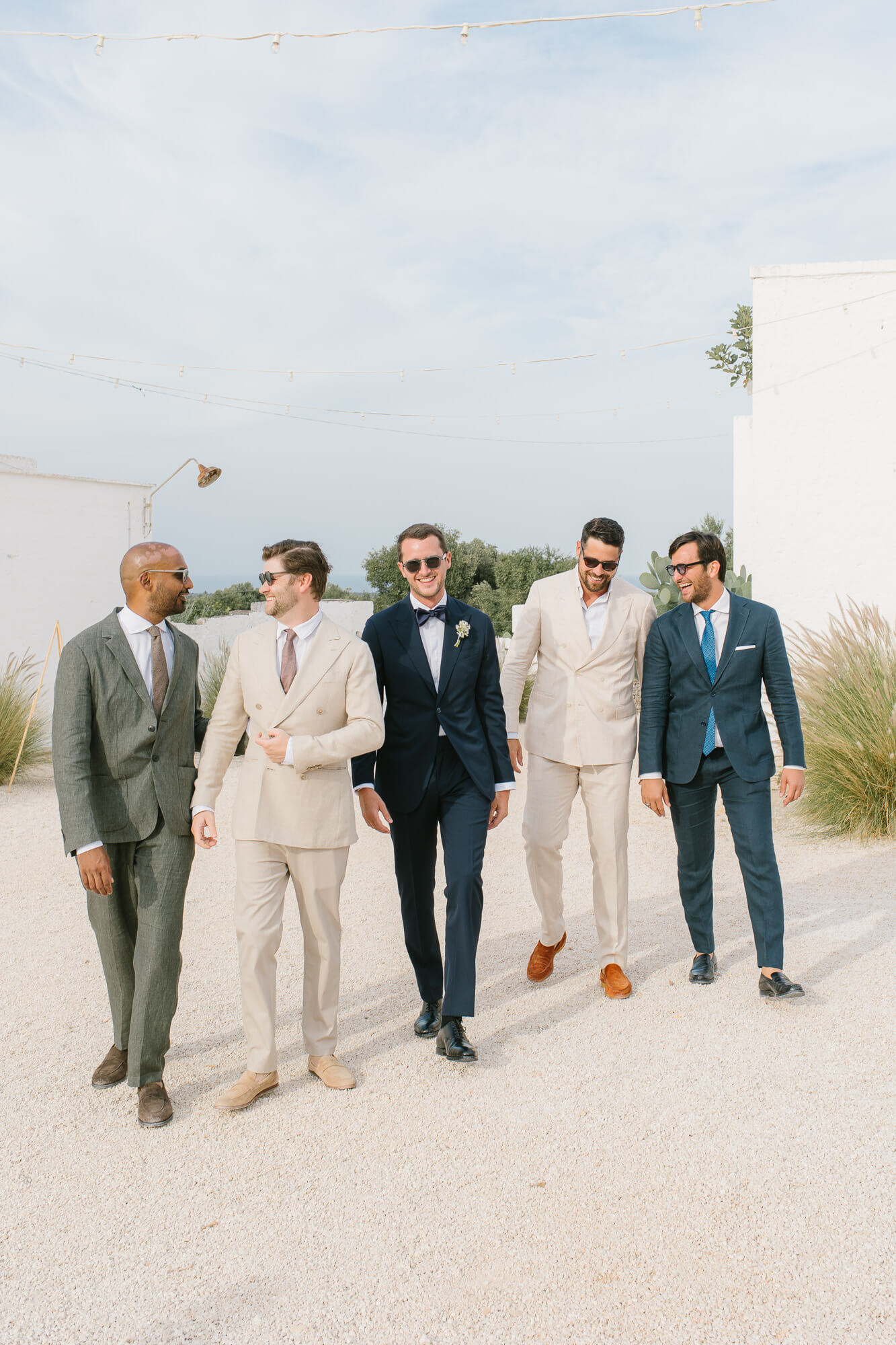 Groom and groomsmen on the terrace at Masseria Mozzone