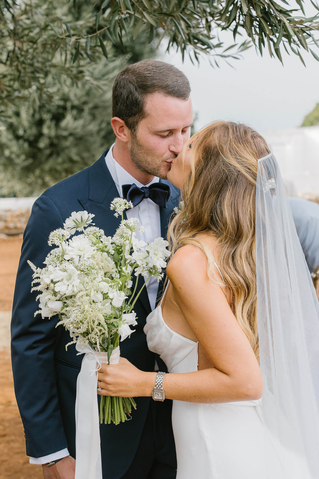 Groom greeting the bride at the altar
