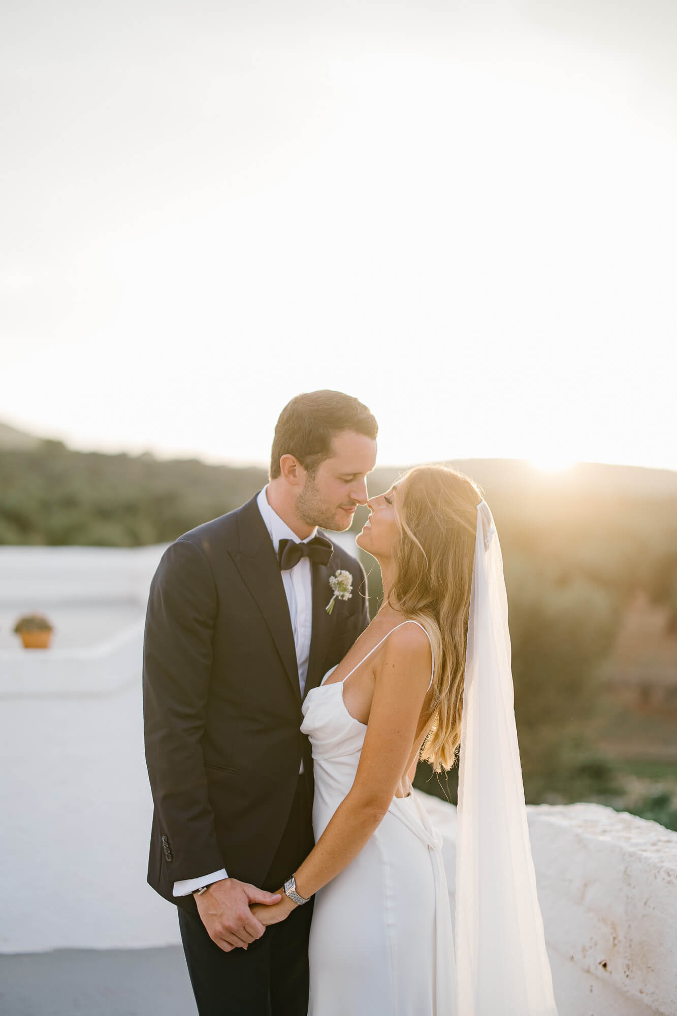 Golden hour kiss on the masseria terrace