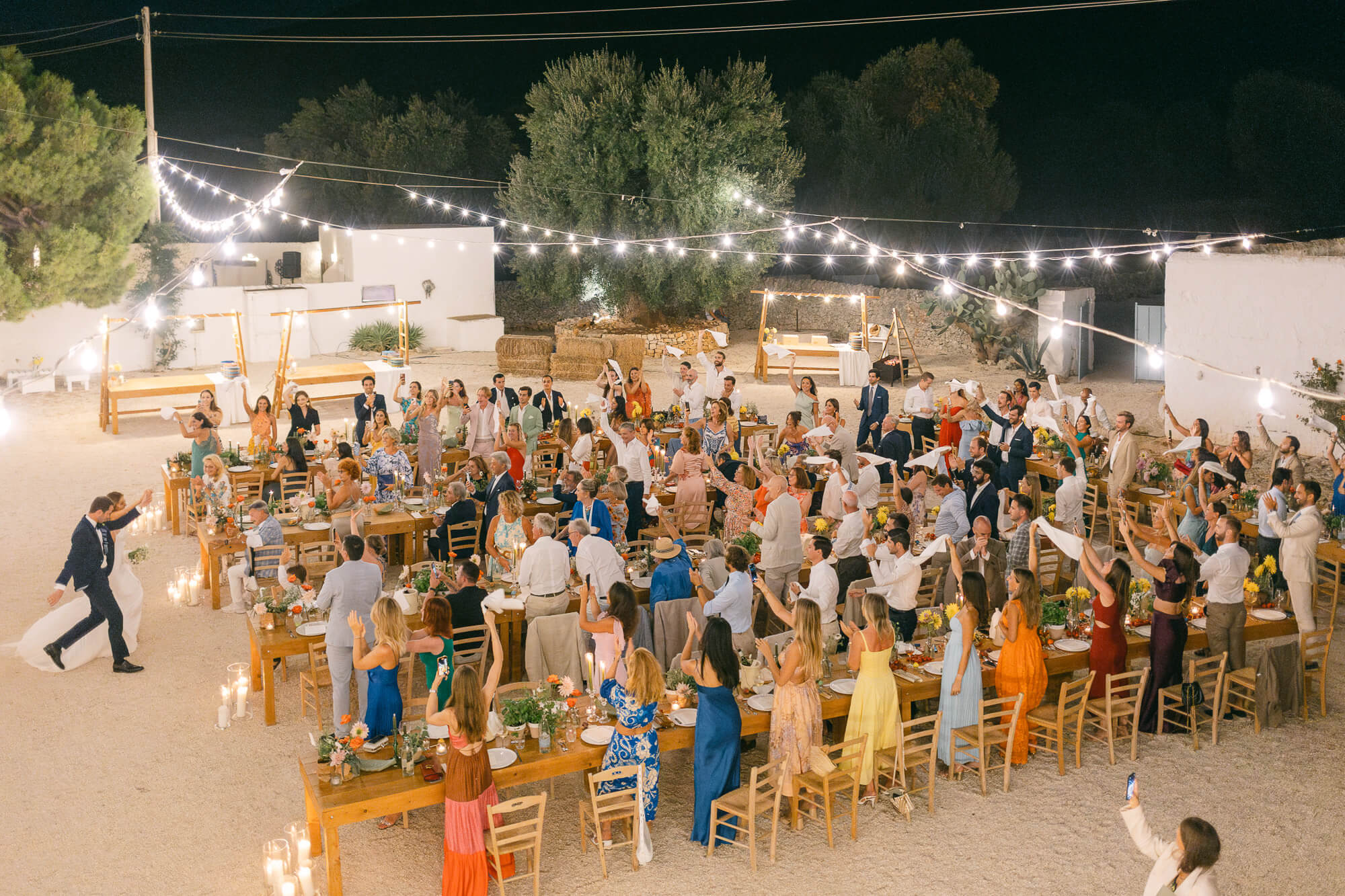 Wedding dinner under string lights