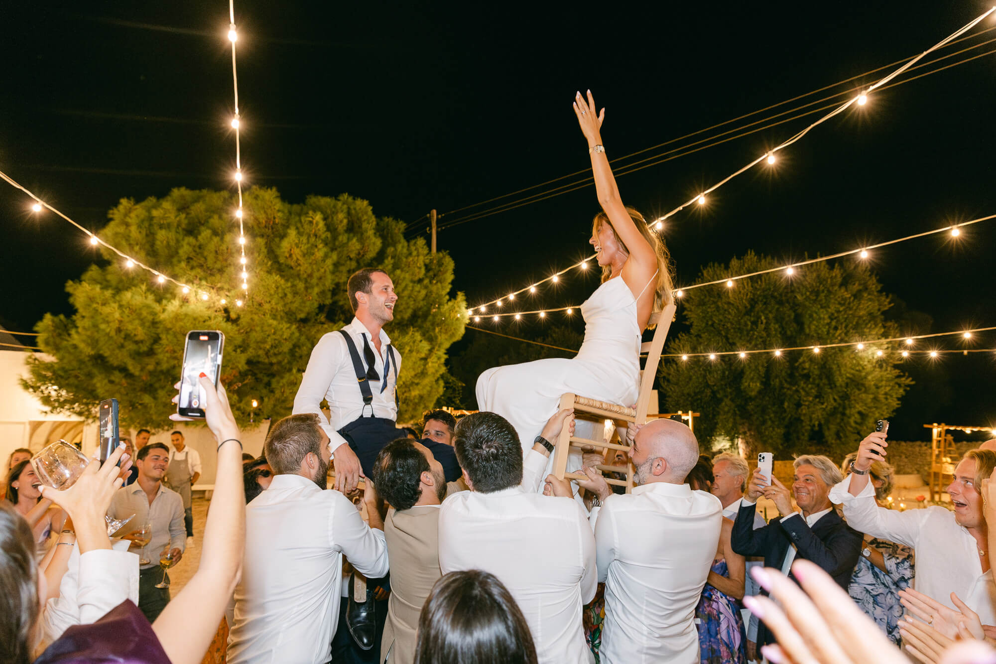 Party under the string lights at Masseria Mozzone