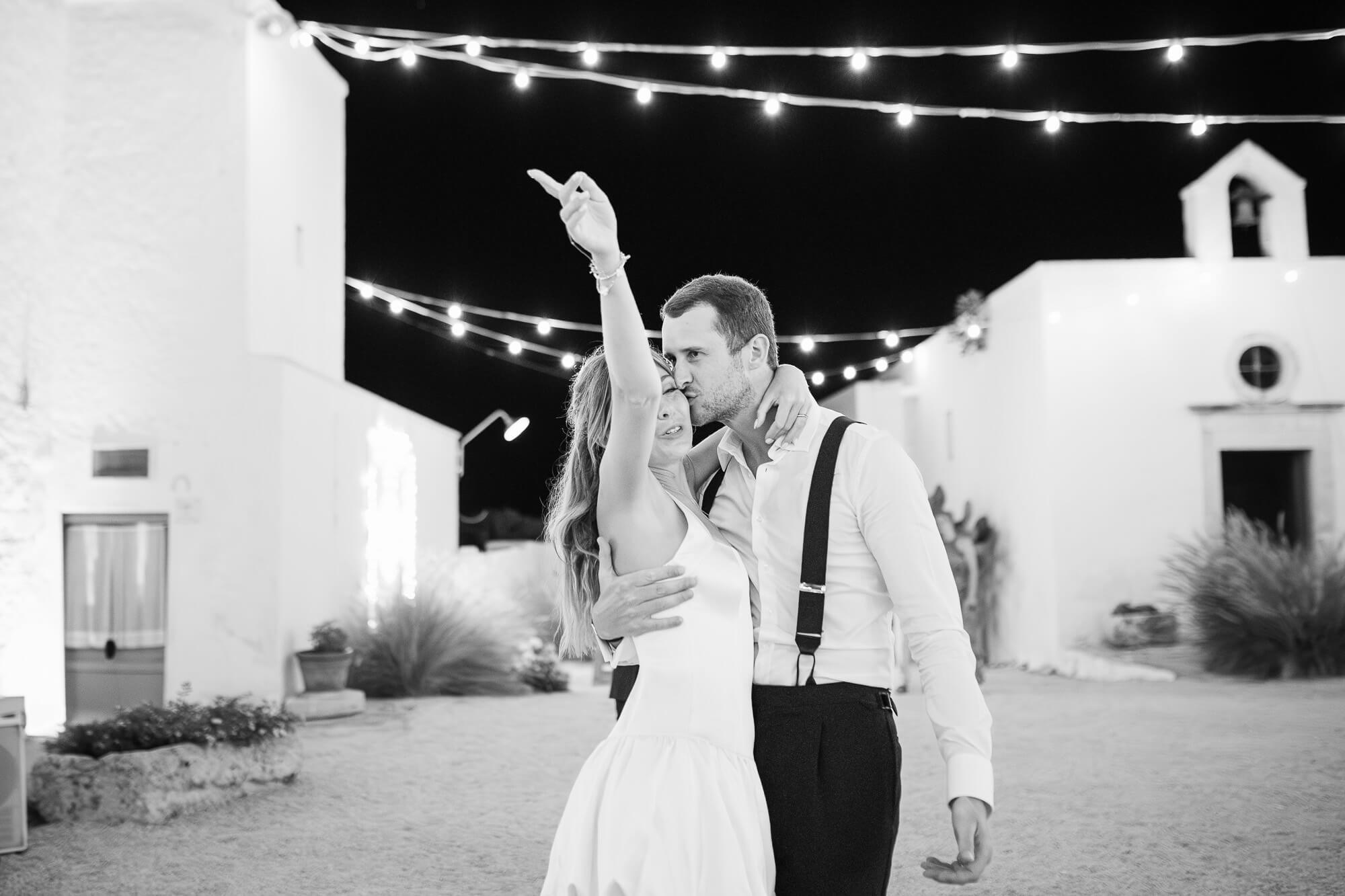 First dance under the string lights at Masseria Mozzone